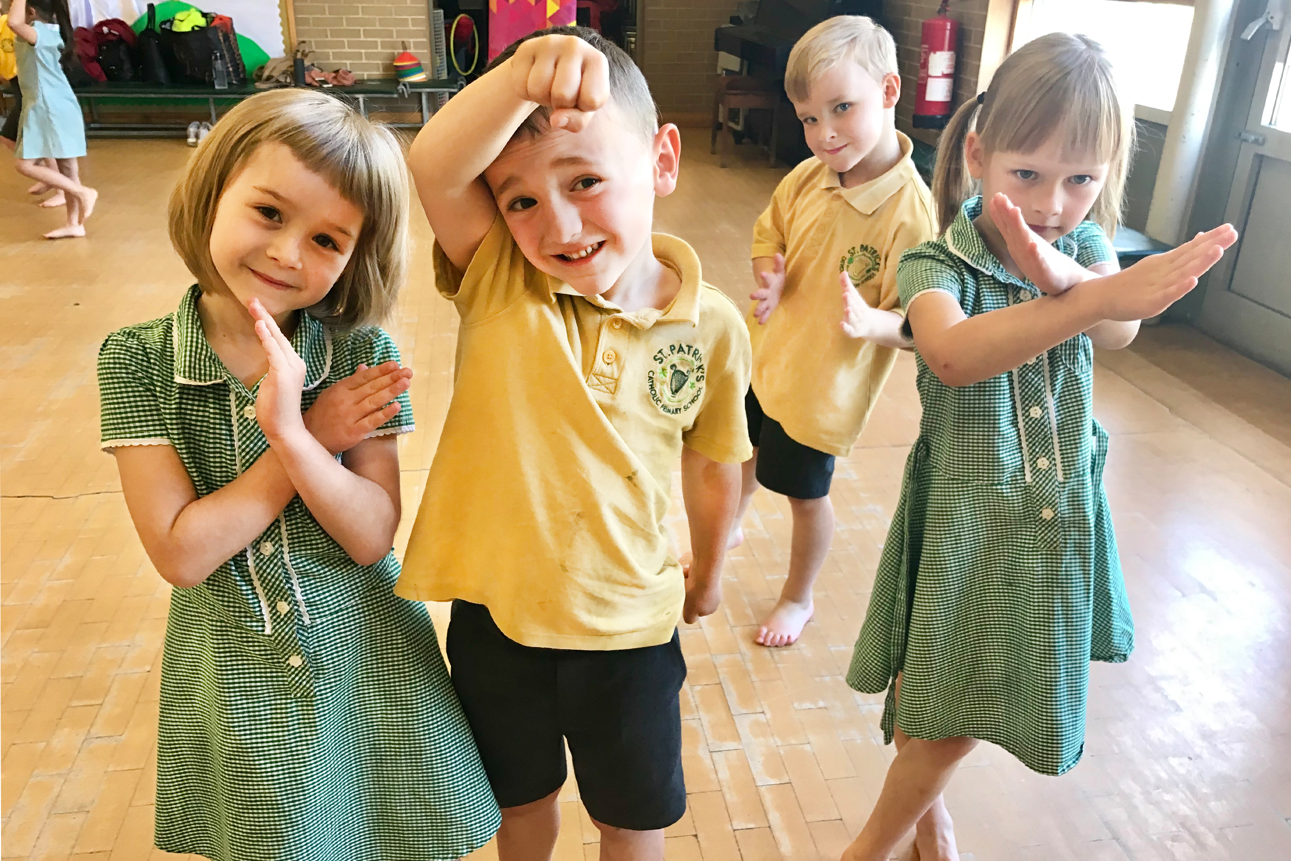 Group of children holding dance poses